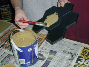 Painting the boards using household emulsion