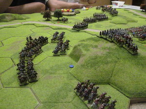 Mongols attack the 7-hex escarpment defended by crossbowmen and heavy cavalry