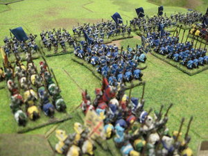The French men at arms advance with the knights following closely behind