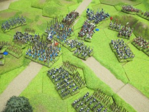 The pike blocks hold their ground and defeat the Lancastrian heavy cavalry