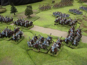 The Korean heavy cavalry advance along and beside the road.