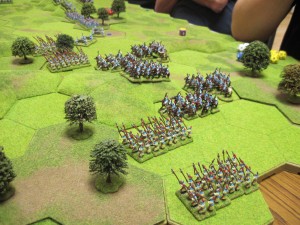 Korean spearmen advance in column with heavy cavalry following behind.